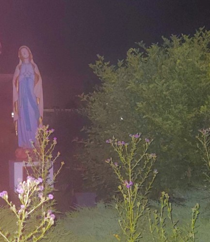 praying atop of a hill