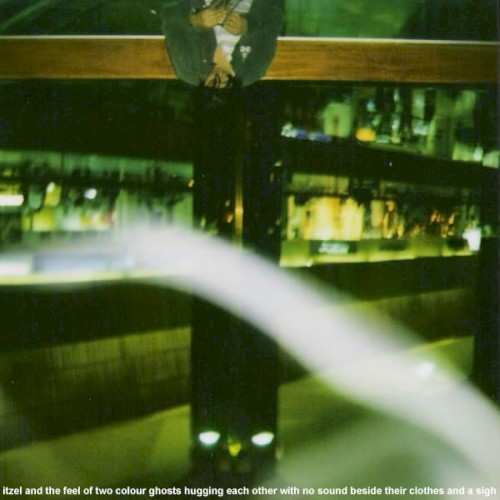 Itzel and the Sound of Two Colour Ghosts Hugging Each Other With No Sound Beside Their Clothes and a Sigh