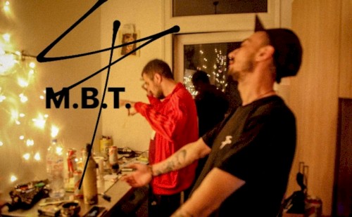 M.B.T.